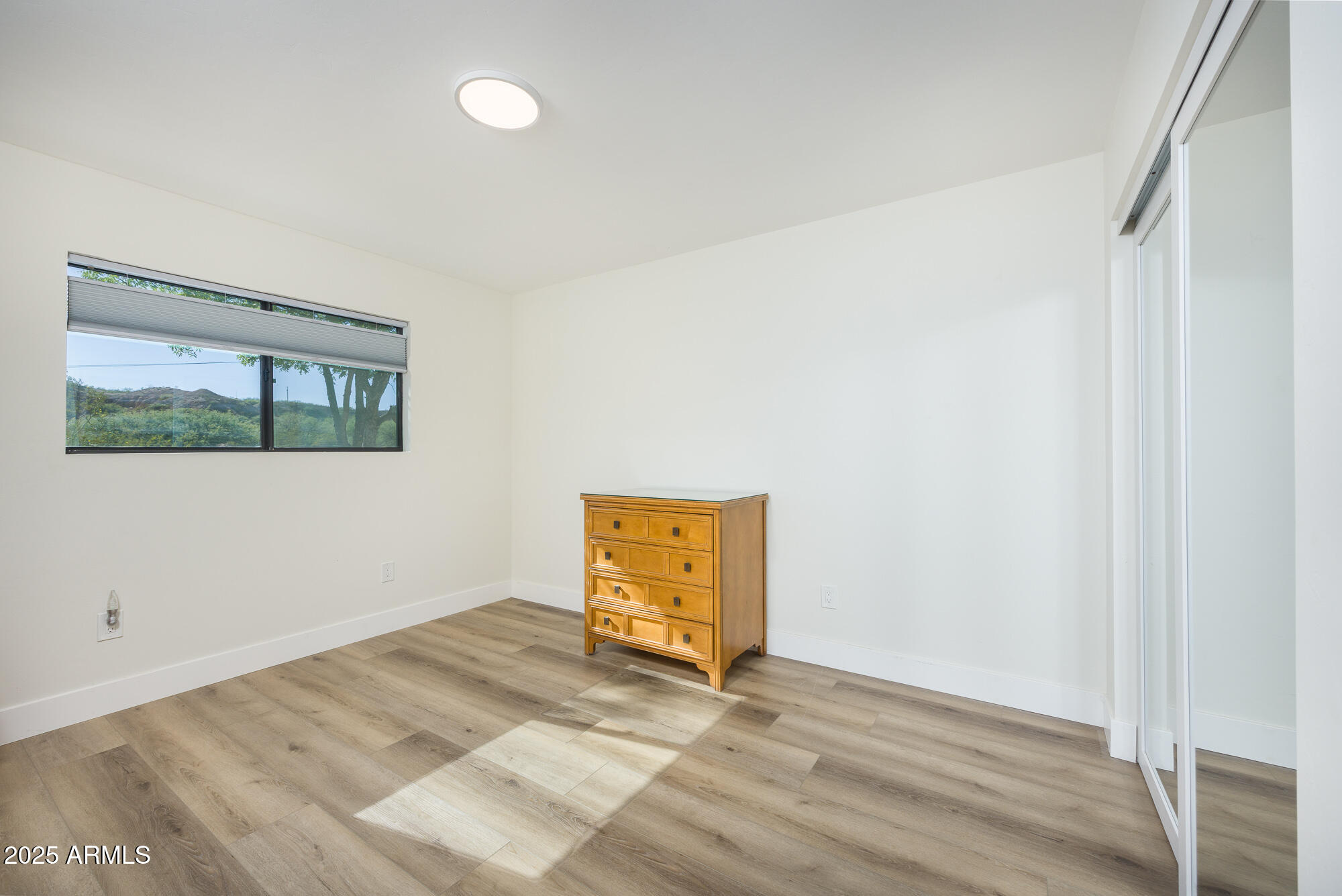 1302 West Coyote Trail Benson, AZ 85602 - Photo 11 of 57 a view of an empty room