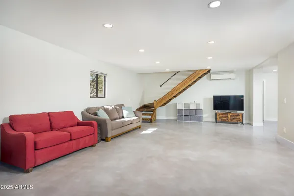 a bathroom with double vanity sink and mirror