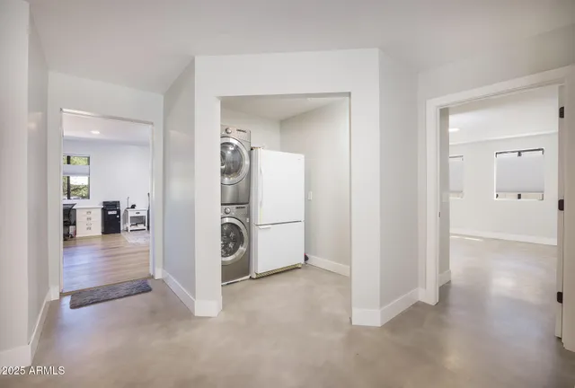 a view of a livingroom with wooden floor