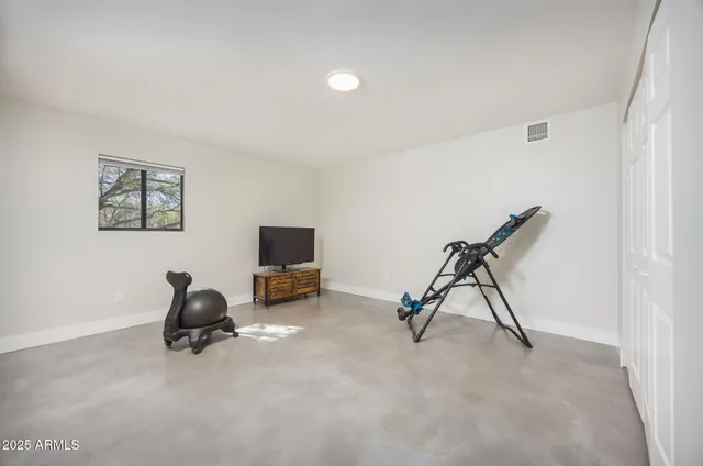 a view of a room with gym equipment
