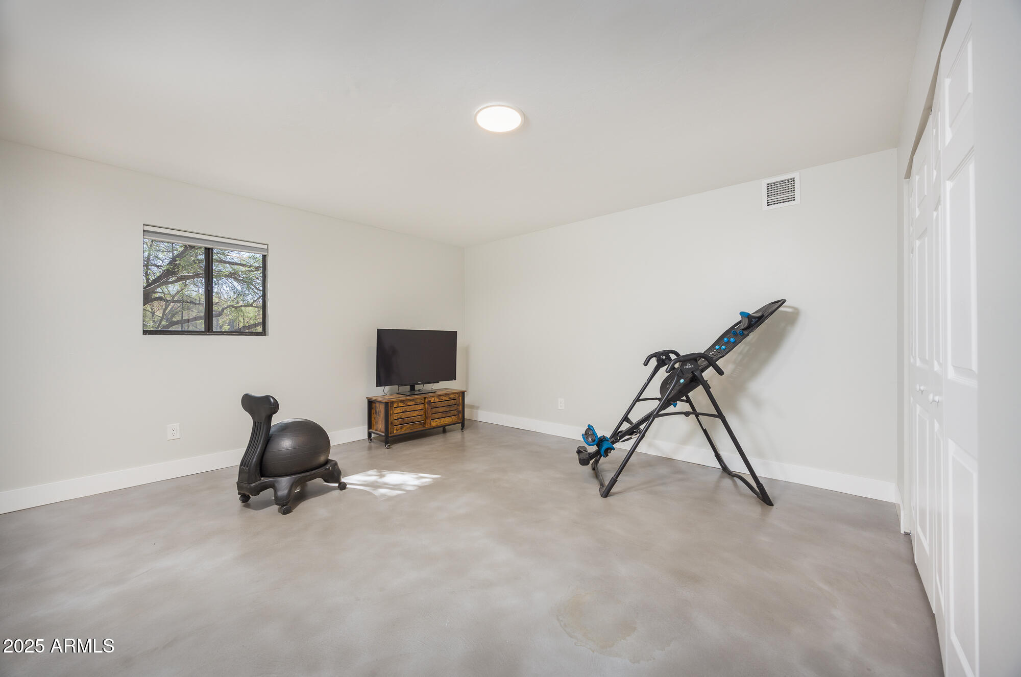 1302 West Coyote Trail Benson, AZ 85602 - Photo 33 of 57 a view of a room with gym equipment