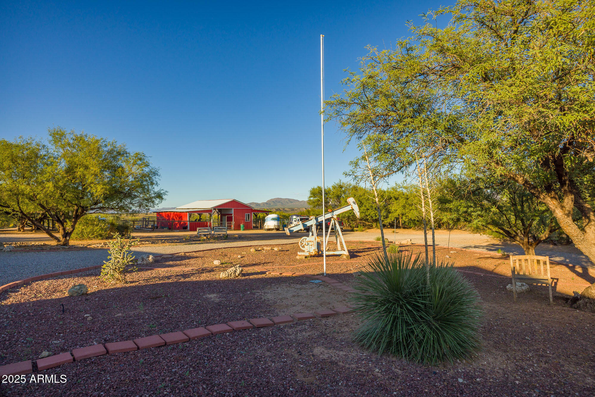 1302 West Coyote Trail Benson, AZ 85602 - Photo 43 of 57 a view of street and with trees