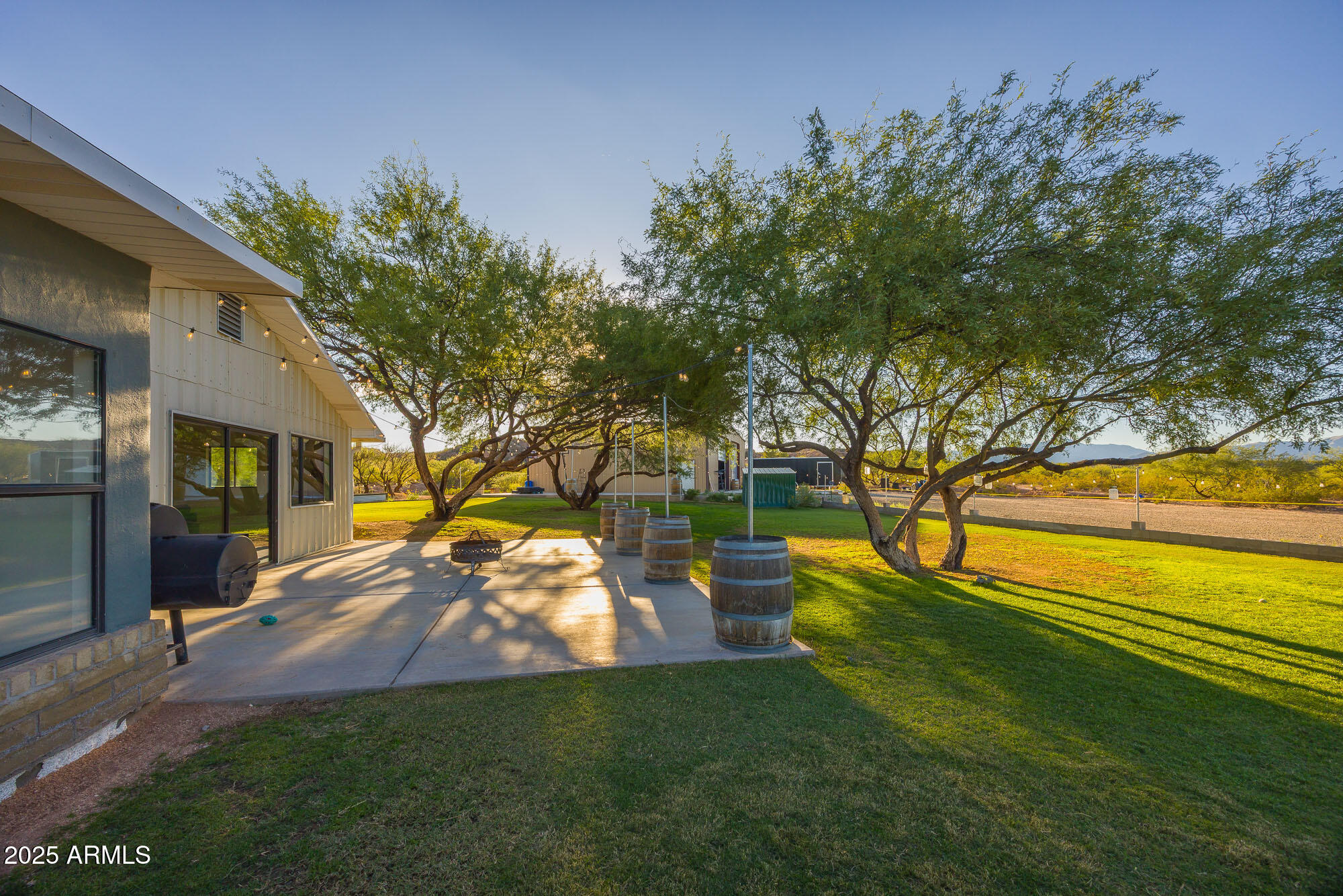 1302 West Coyote Trail Benson, AZ 85602 - Photo 46 of 57 a view of a park with large trees