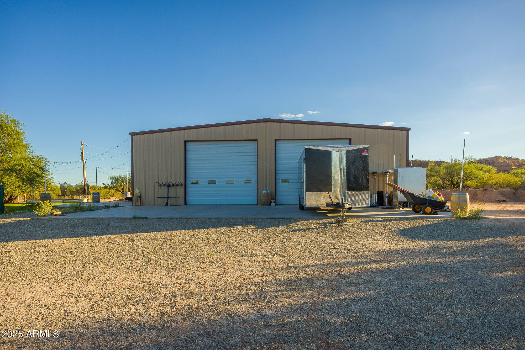 1302 West Coyote Trail Benson, AZ 85602 - Photo 47 of 57 a view of a house with backyard and porch
