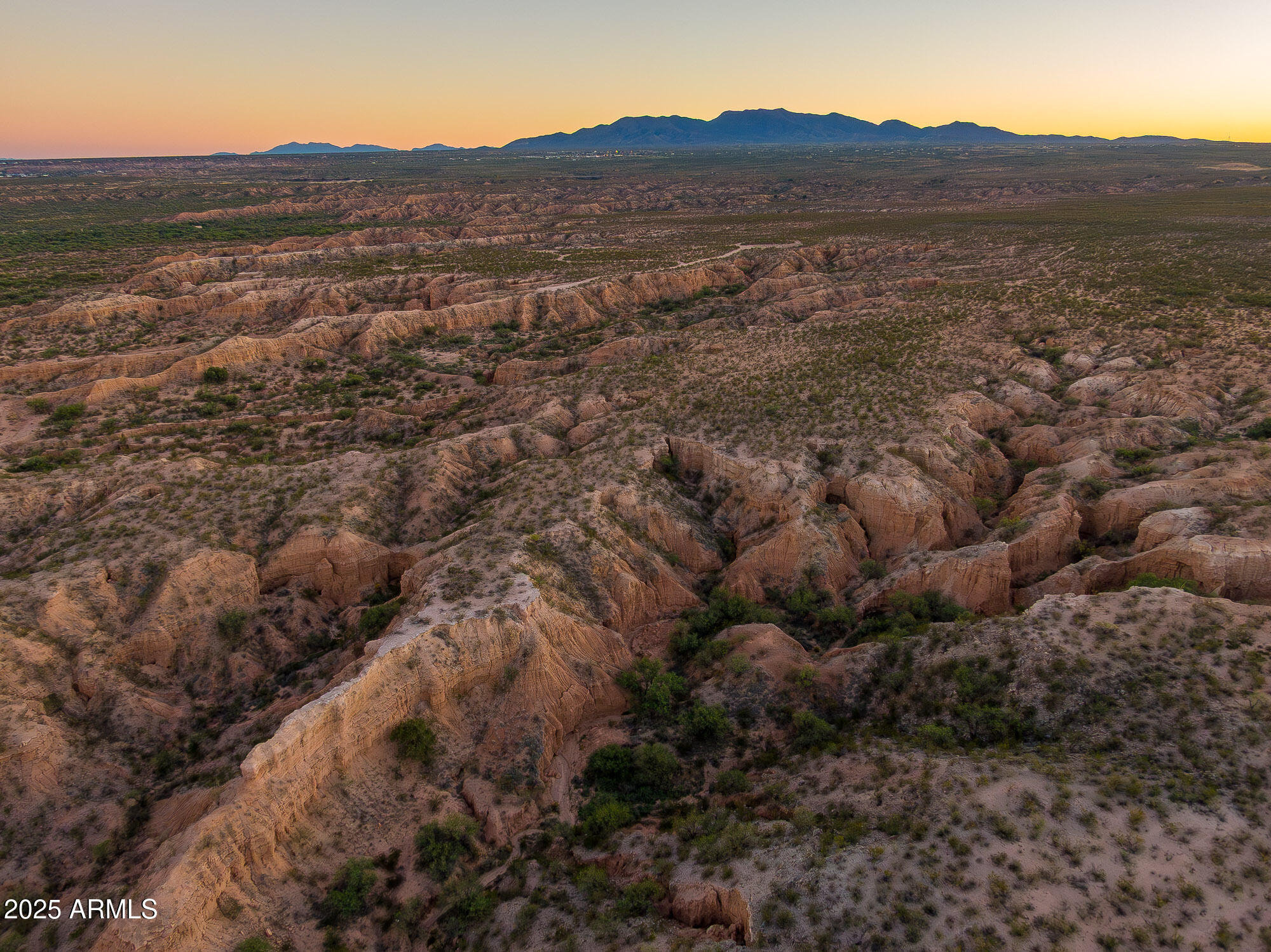 1302 West Coyote Trail Benson, AZ 85602 - Photo 57 of 57 a view of a large mountain with a mountain in the background