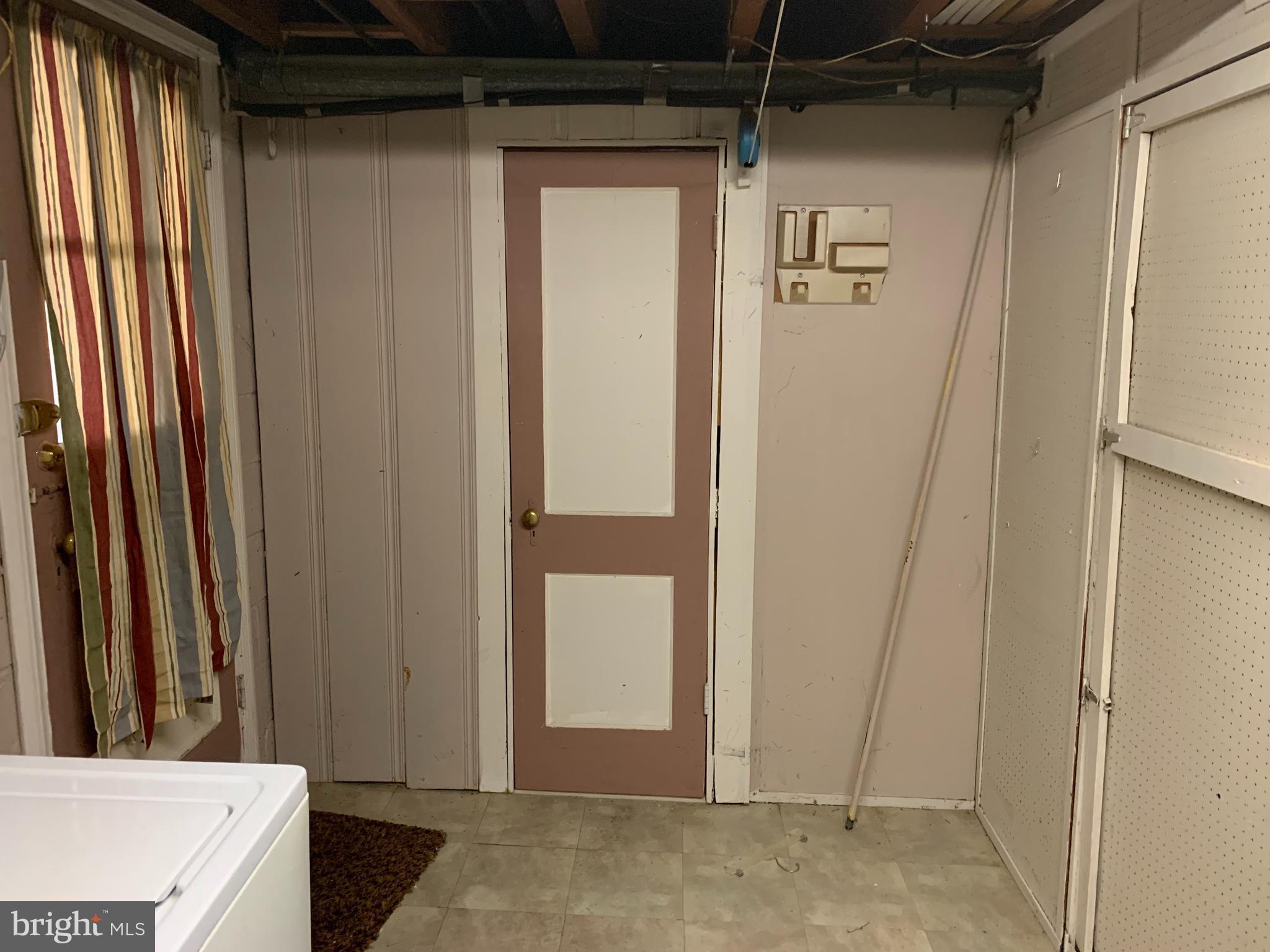 1434 Langford Road Gwynn Oak, MD 21207 - Photo 28 of 36 Half bath / Walkout door from Basement
