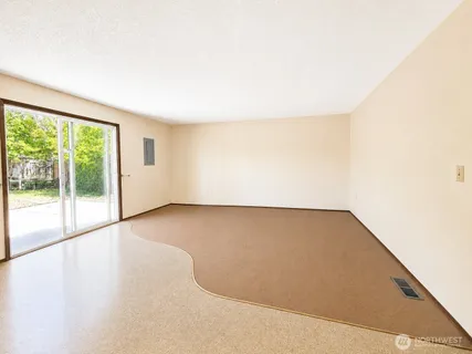 a view of a big room with wooden floor