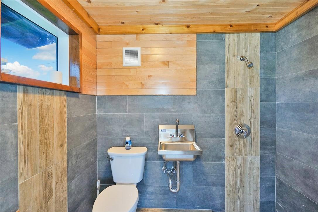 17020 Southwest 62nd Street Southwest Ranches, FL 33331 - Photo 11 of 44 a bathroom with a toilet sink and shower
