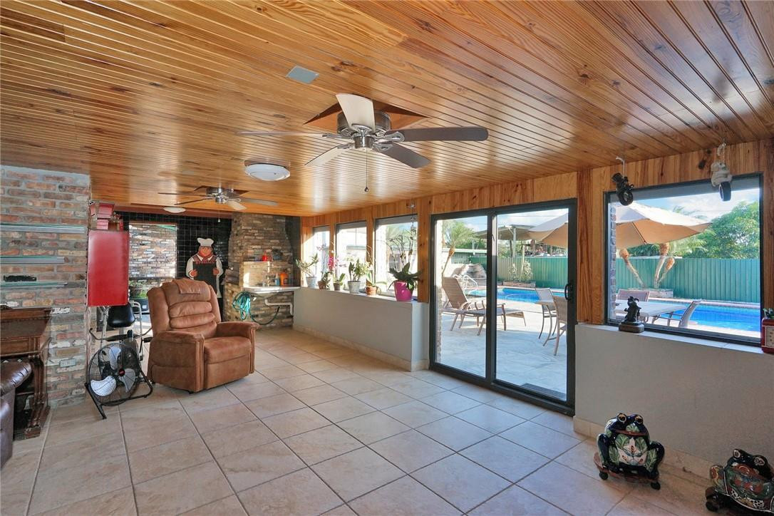 17020 Southwest 62nd Street Southwest Ranches, FL 33331 - Photo 26 of 44 a view of a patio with table and chairs