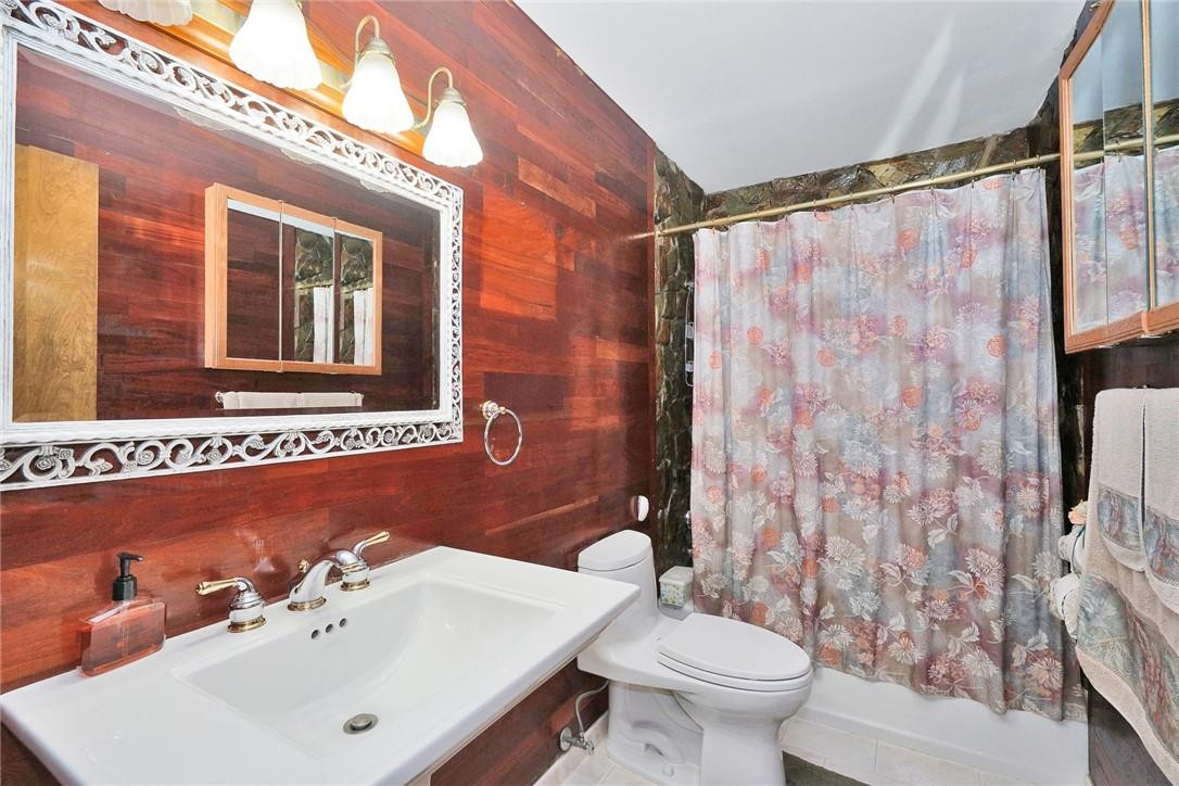 17020 Southwest 62nd Street Southwest Ranches, FL 33331 - Photo 34 of 44 a bathroom with a sink mirror and a toilet