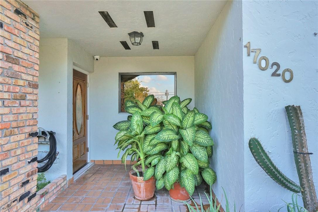 17020 Southwest 62nd Street Southwest Ranches, FL 33331 - Photo 4 of 44 a view of a entryway with flower pots