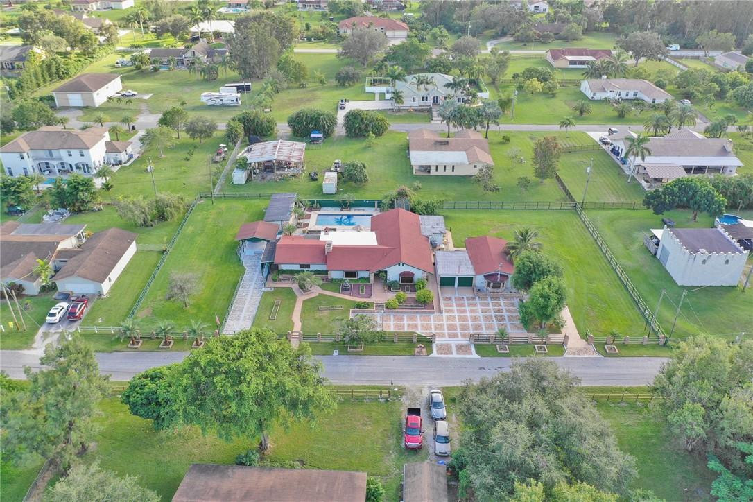 17020 Southwest 62nd Street Southwest Ranches, FL 33331 - Photo 41 of 44 an aerial view of residential houses with outdoor space and street view