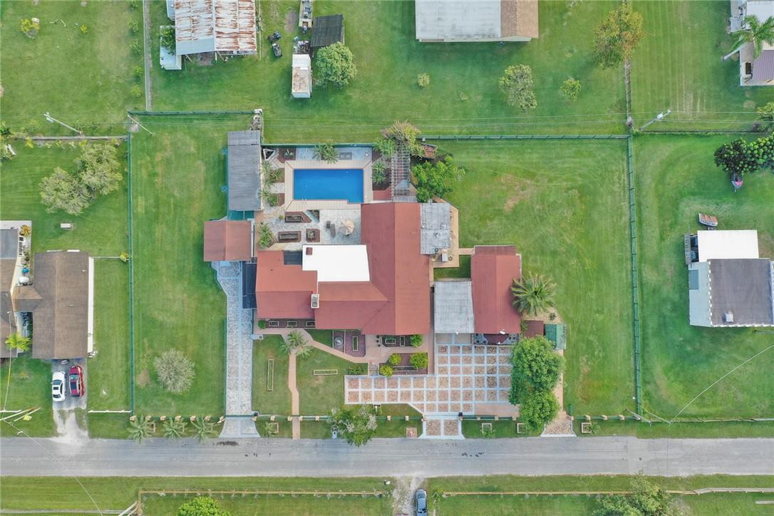 17020 Southwest 62nd Street Southwest Ranches, FL 33331 - Photo 42 of 44 an aerial view of a house with a yard