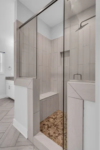 a view of an empty room with a closet