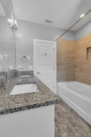 a bathroom with a bathtub