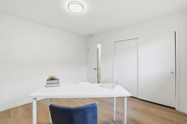 a backyard of a house with green landscape