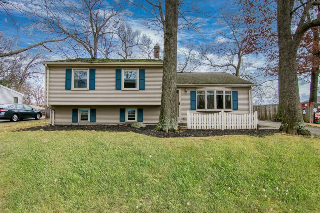 127 Sawmill Road Springfield, MA 01118 - Photo 1 of 28 a view of a house with a yard
