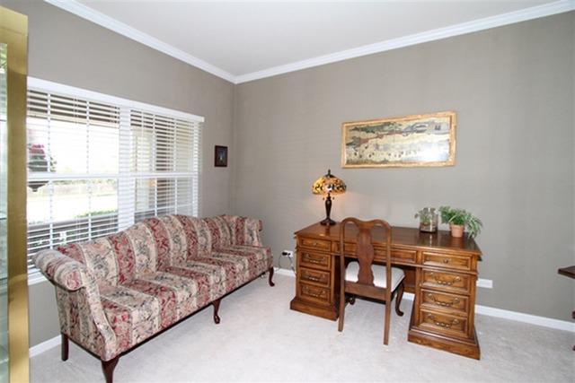 409 Inverness Drive Gurnee, IL 60031 - Photo 14 of 25 a living room with furniture and a window