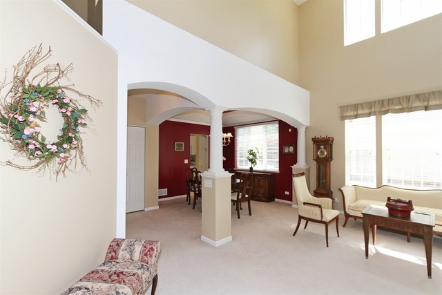 409 Inverness Drive Gurnee, IL 60031 - Photo 3 of 25 a view of a livingroom with furniture and a window