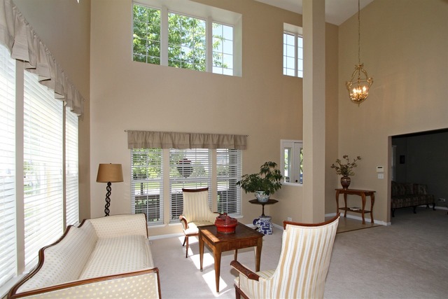 409 Inverness Drive Gurnee, IL 60031 - Photo 5 of 25 a living room with furniture and a large window