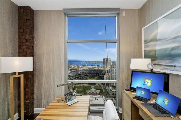 a lobby with furniture and rug