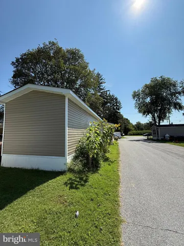 a view of a back yard of the house