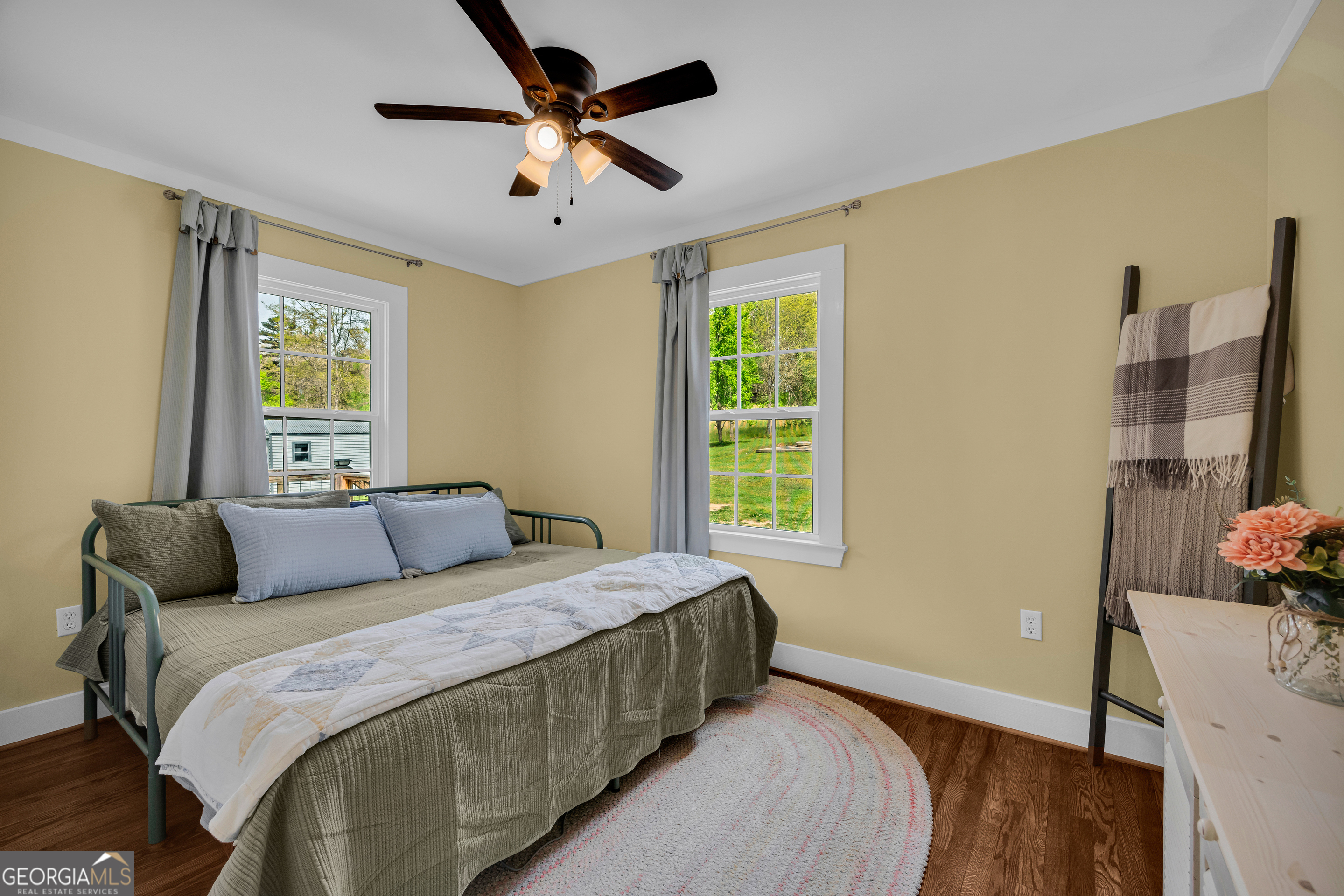 261 Oak Valley Road Toccoa, GA 30577 - Photo 28 of 52 a bedroom with a bed and a window