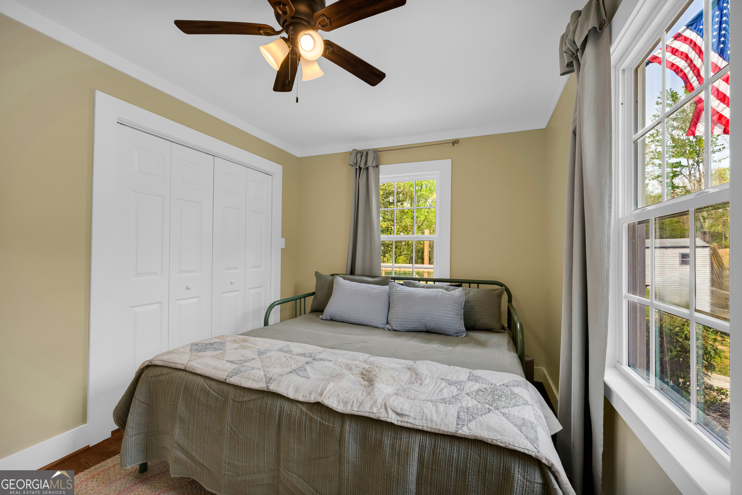 261 Oak Valley Road Toccoa, GA 30577 - Photo 29 of 52 a bedroom with a bed and a window