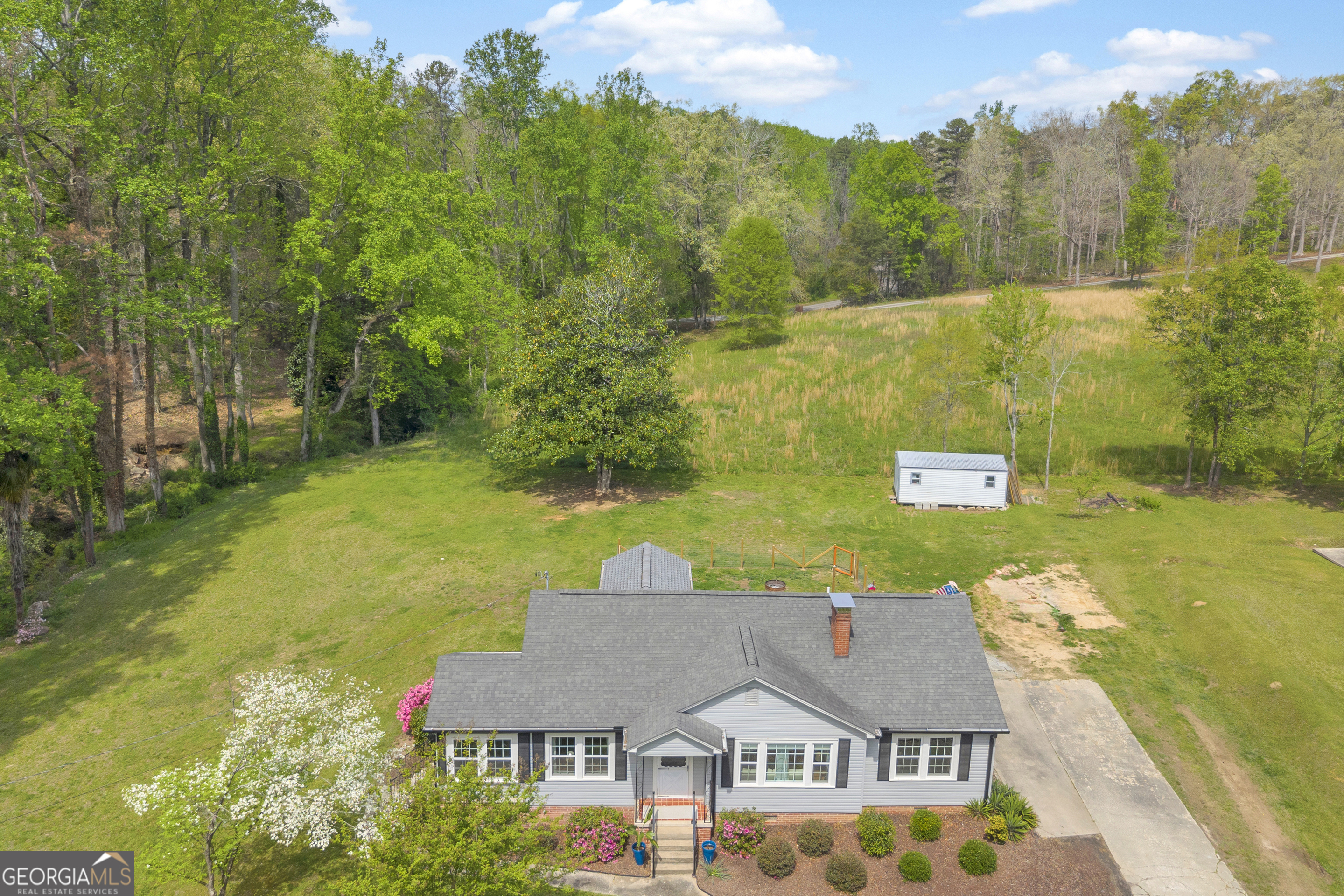 261 Oak Valley Road Toccoa, GA 30577 - Photo 44 of 52 a view of a lake with houses