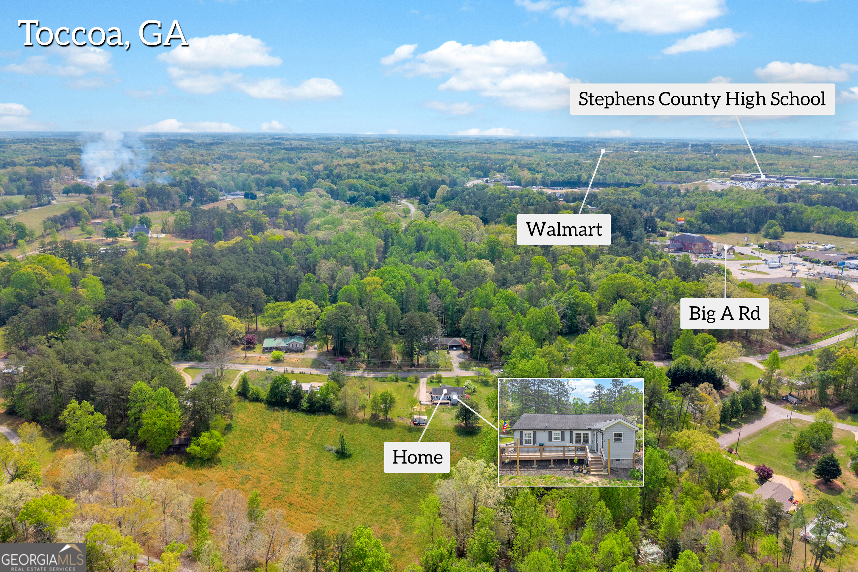 261 Oak Valley Road Toccoa, GA 30577 - Photo 48 of 52 a view of a city with tall buildings