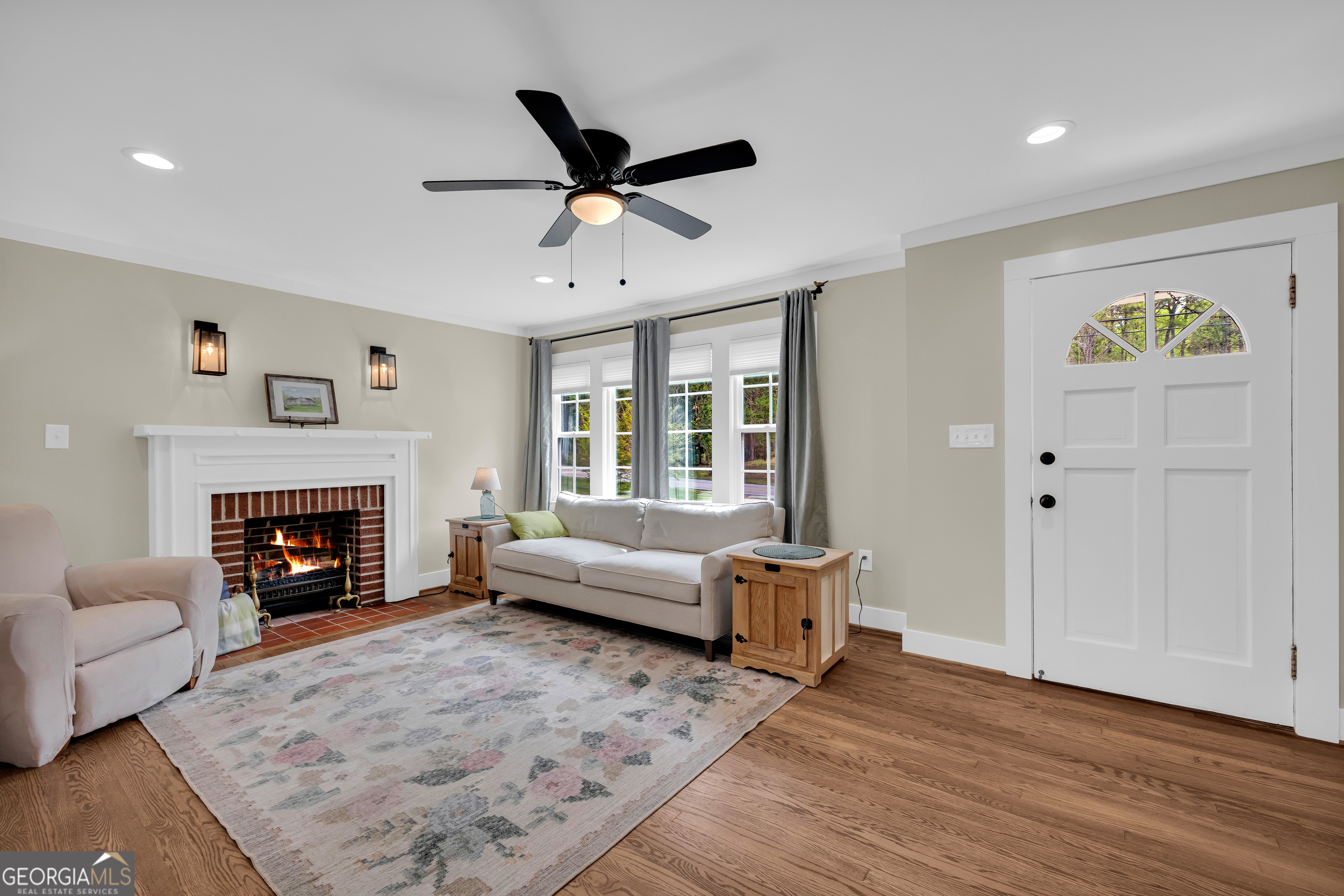 261 Oak Valley Road Toccoa, GA 30577 - Photo 10 of 52 a living room with furniture and a fireplace