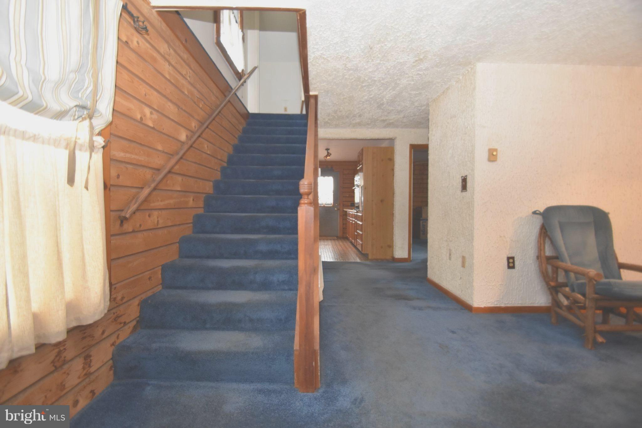 5638 Prince George Street Baltimore, MD 21207 - Photo 7 of 15 a view of entryway and hall with wooden floor