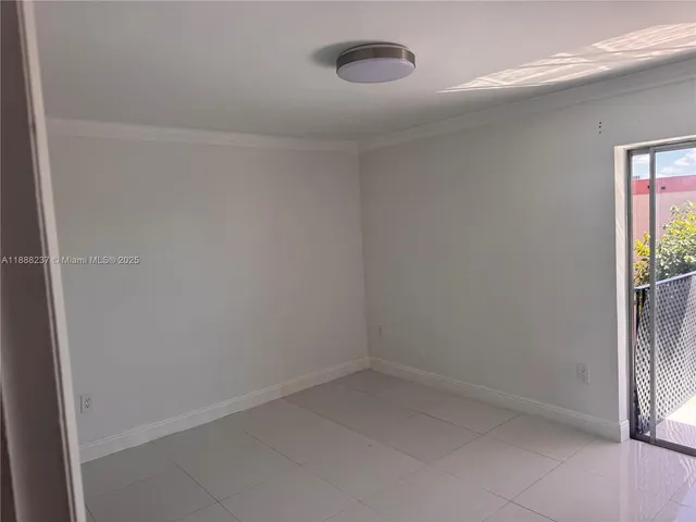 a view of a room with an entryway