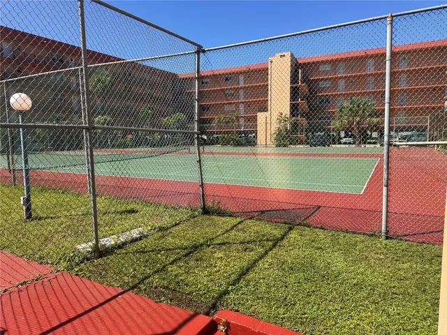a view of outdoor space with car parked