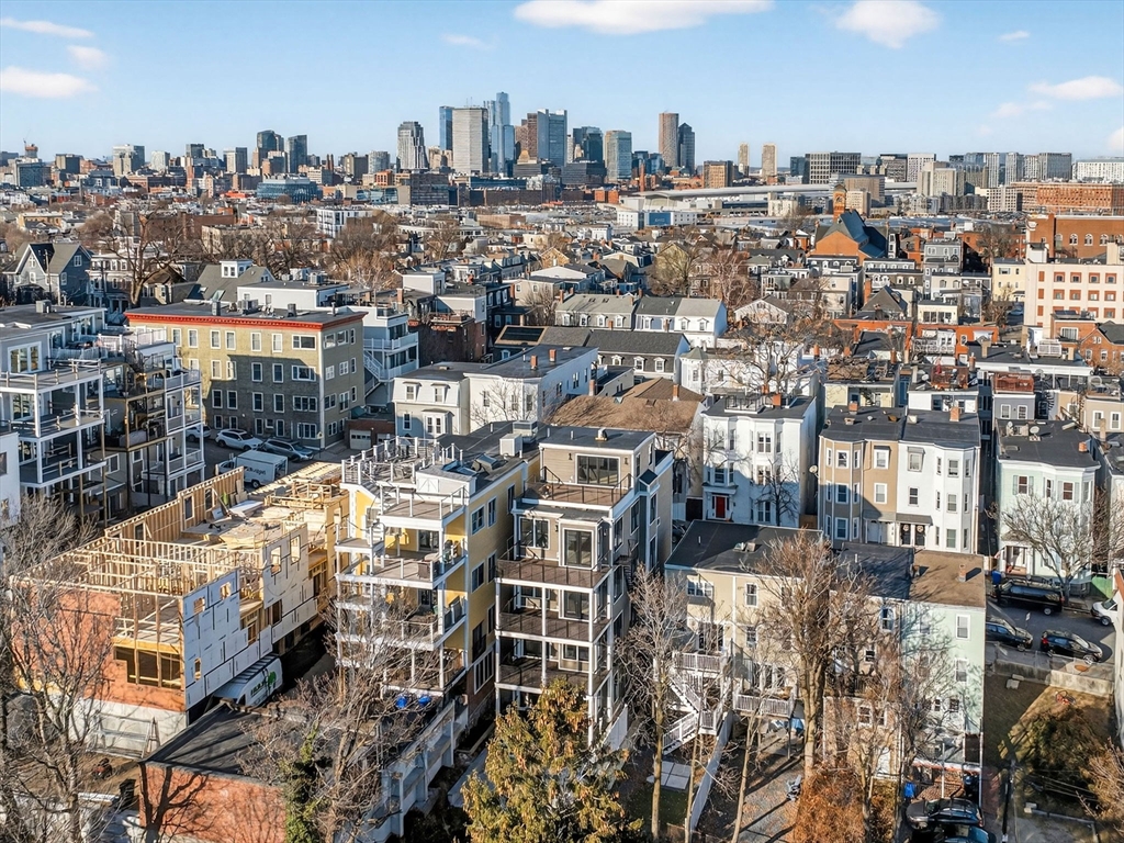 427 East 6th Street, Unit 1 Boston, MA 02127 - Photo 27 of 30 a view of a city with tall buildings