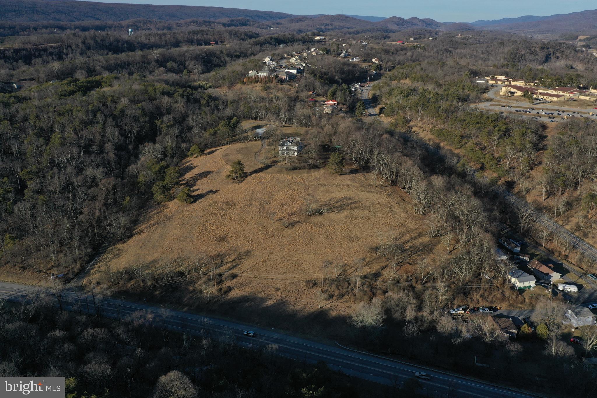 12101 Windsor Hills Pr Road Cumberland, MD 21502 - Photo 3 of 13 an aerial view of house with yard