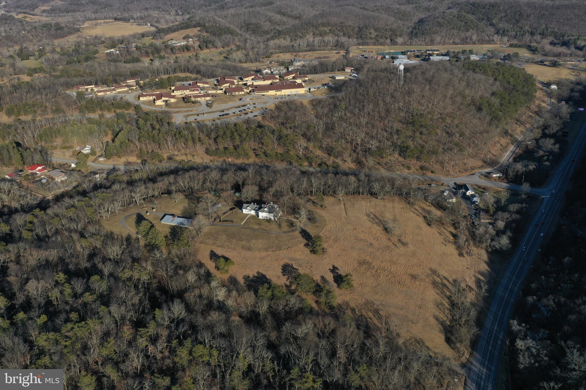 12101 Windsor Hills Pr Road Cumberland, MD 21502 - Photo 4 of 13 a view of lot of trees and houses