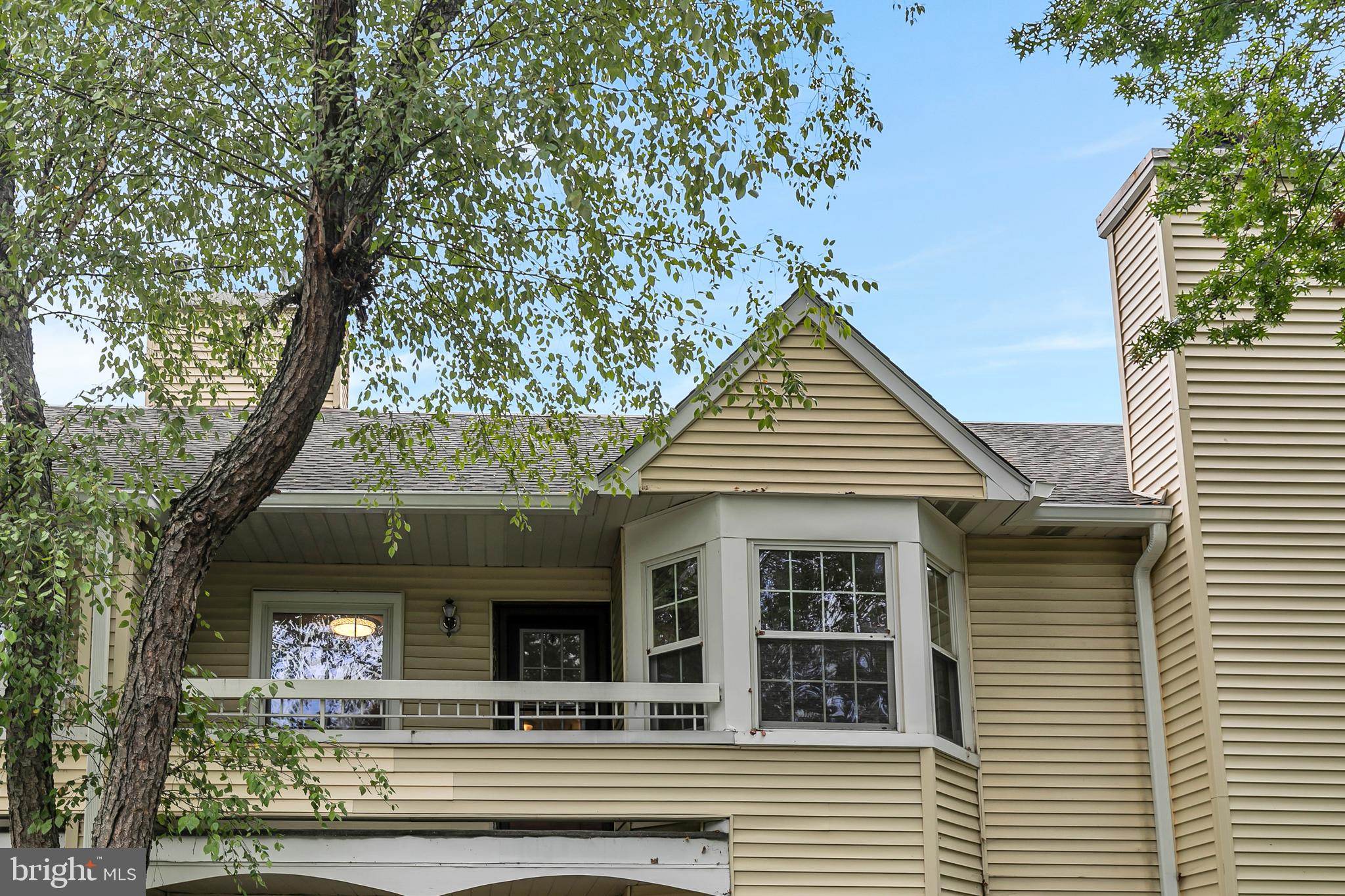 5 Mill Run West, Unit 5 Hightstown, NJ 08520 - Photo 3 of 26 front view of a house with a porch