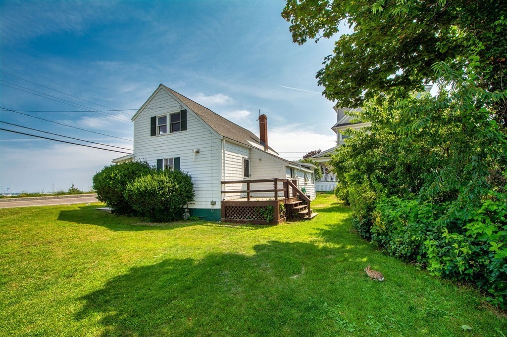 121 Jericho Road Scituate, MA 02066 - Photo 3 of 8 a house view with a outdoor space