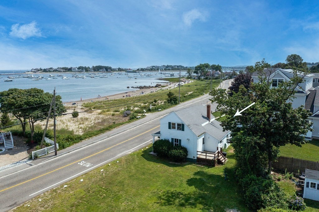 121 Jericho Road Scituate, MA 02066 - Photo 5 of 8 a view of a terrace with a garden