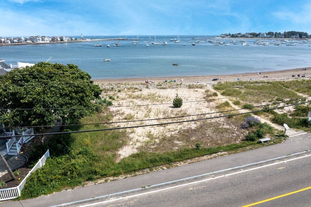121 Jericho Road Scituate, MA 02066 - Photo 6 of 8 a view of a street with an ocean view