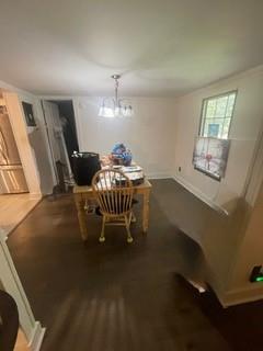 1184 Robert Hardeman Road Winterville, GA 30683 - Photo 11 of 20 a view of a dining room with furniture and chandelier