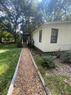 1184 Robert Hardeman Road Winterville, GA 30683 - Photo 2 of 20 a backyard of a house with lots of green space