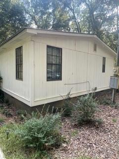 1184 Robert Hardeman Road Winterville, GA 30683 - Photo 8 of 20 a house view with a backyard space