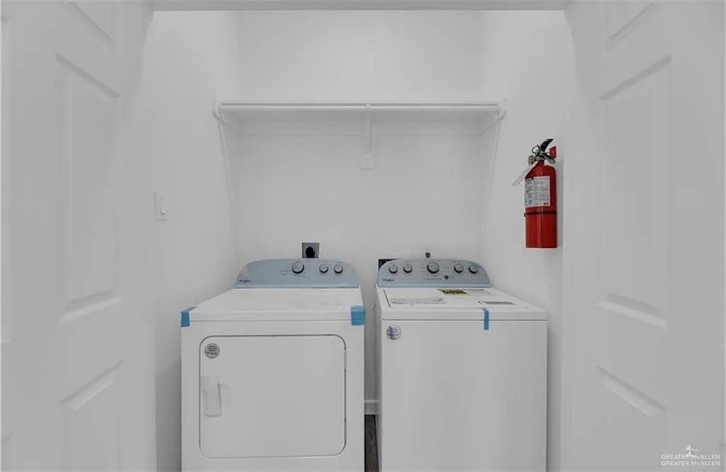 1403 Marcela Drive, Unit 1 Weslaco, TX 78599 - Photo 13 of 13 Laundry area featuring washing machine and dryer