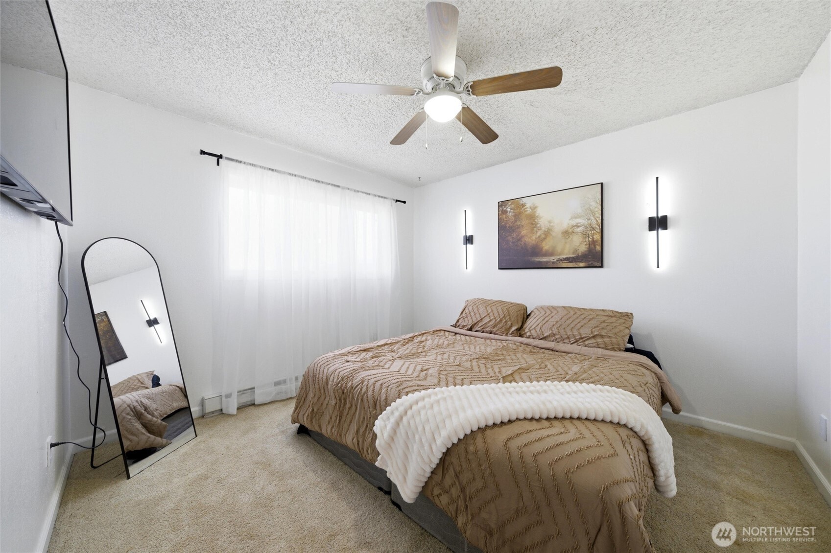 762 South 2nd Avenue Connell, WA 99326 - Photo 16 of 20 a bed sitting in a bedroom next to a window