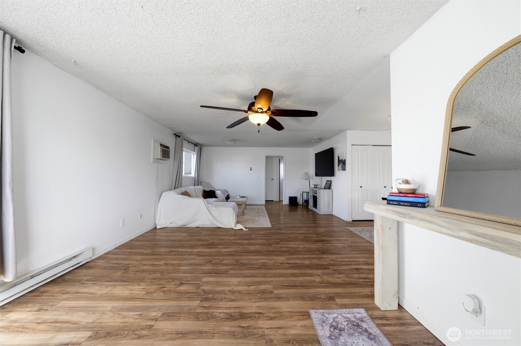762 South 2nd Avenue Connell, WA 99326 - Photo 3 of 20 a bedroom with a bed and a chandelier