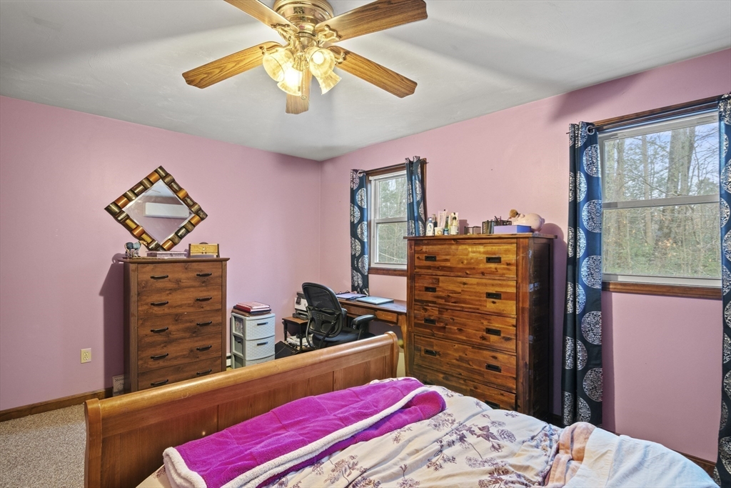 4 Wilson Way Rutland, MA 01543 - Photo 22 of 32 a bedroom with a bed and a dresser
