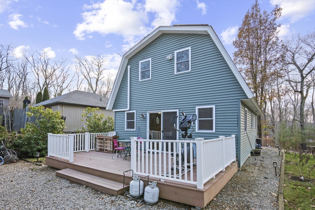4 Wilson Way Rutland, MA 01543 - Photo 26 of 32 a view of a house with a yard and trees