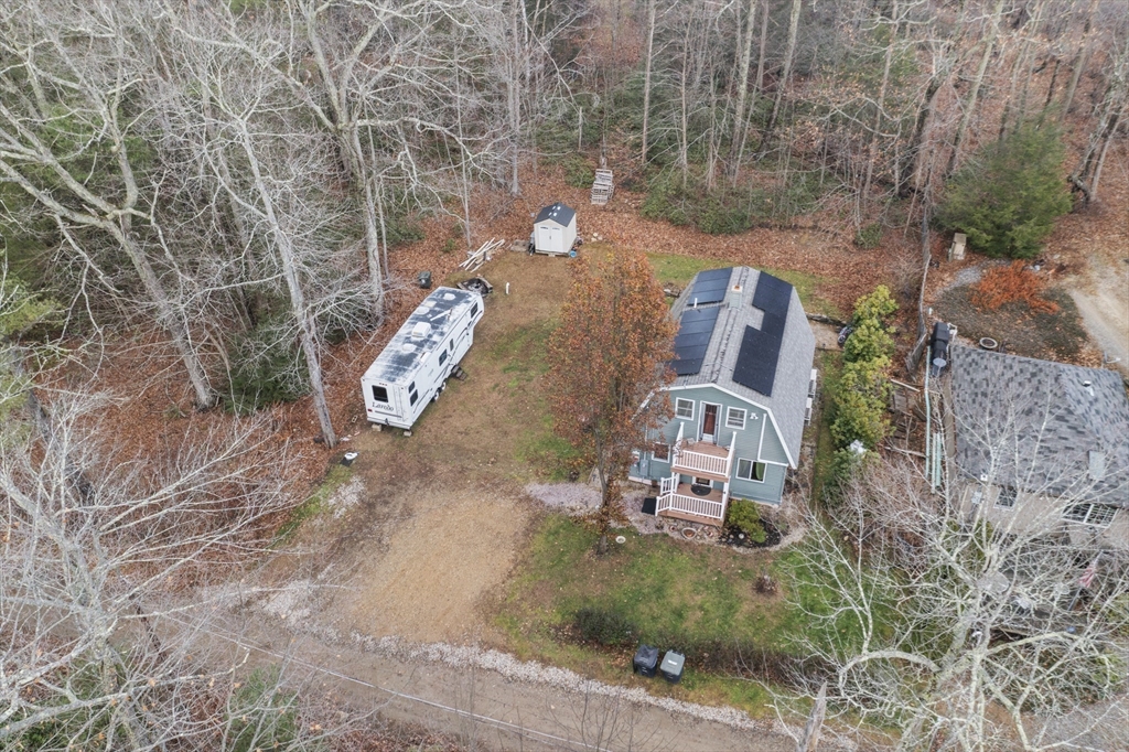 4 Wilson Way Rutland, MA 01543 - Photo 30 of 32 an aerial view of a house with a yard and large trees